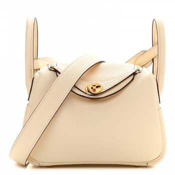 an Hermes Taurillon Clemence Mini Lindy size 20 in the Nata (cream) color